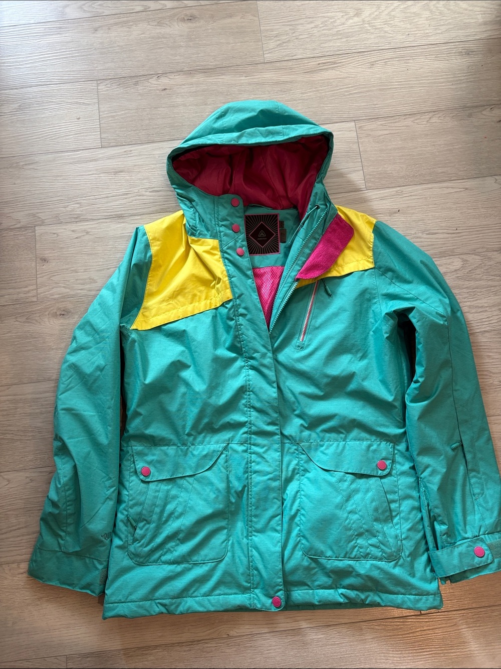 Women’s Teal Ski Jacket with Yellow Shoulder Panels
